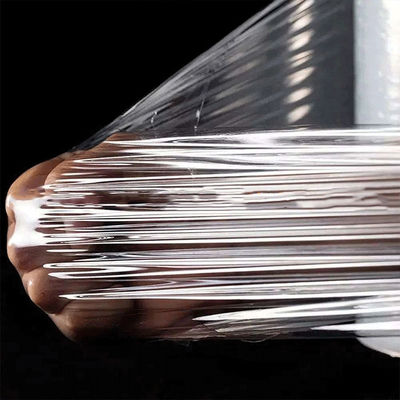 Pengelupasan makanan segar Film perekat PVDC transparan Film perekat Slide Cutter Stretch Film
